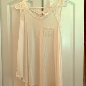 White flowy sleeveless shirt